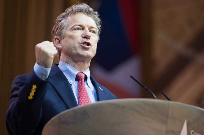 Man in a suit passionately delivering a speech at a podium