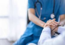 Deadly Nurse Linked To Dozens More Deaths Nurse comforting a patient by holding hands