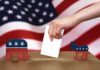 Billionaire Cash Floods Key Swing Race Hand casting ballot between Republican elephant and Democratic donkey