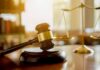 Parental Rights Clash Hits New Jersey Judge's gavel on a block with scales of justice in the background