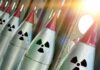 Row of missiles with radiation symbols and red tips