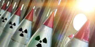 Row of missiles with radiation symbols and red tips