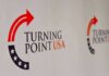 Controversial Comic Headlining TPUSA Tour Turning Point USA logo on a backdrop