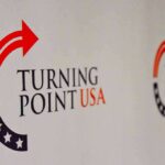 Turning Point USA logo on a backdrop