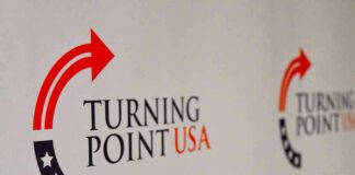 Turning Point USA logo on a backdrop