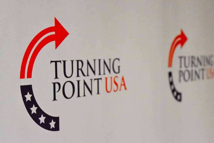 shutterstock_1232509096 Turning Point USA logo on a backdrop