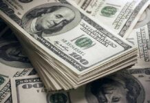 Senate Shock: Massive MAGA Money Hits Stack of US 100 dollar bills