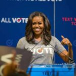 How Confessions Became Fake ‘Misery’ woman speaking at a podium during a voting event