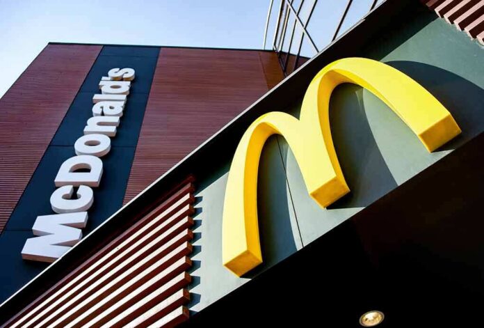 shutterstock_1364450678 McDonald's restaurant exterior with golden arches sign