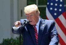Rare Move Flips Spending Rules Donald Trump speaking at a podium and pointing during a speech
