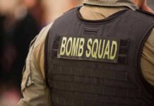 Bomb squad officer wearing tactical vest