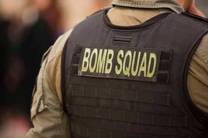 Bomb squad officer wearing tactical vest