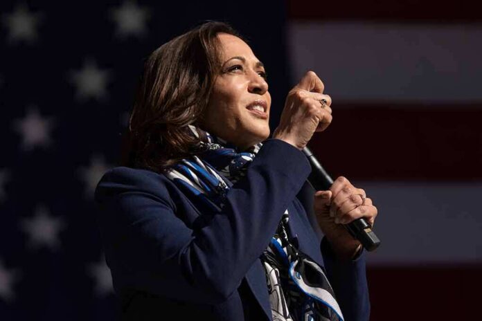 Woman speaking on stage with microphone