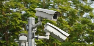 surveillance cameras mounted on a metal pole