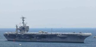 Aircraft carrier sailing at sea