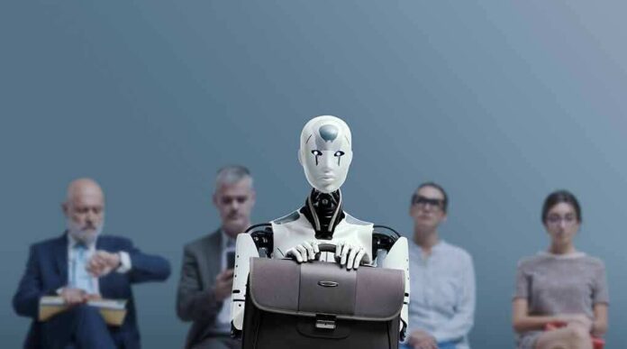 shutterstock_2268772859 Humanoid robot holding a briefcase among seated job applicants
