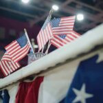 GOP War Drums Thunder in Dallas American flags on display at an indoor venue