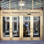 $10 Million Tsunami Hits Texas Race Federal Communications Commission building entrance with gold doors