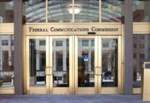 $10 Million Tsunami Hits Texas Race Federal Communications Commission building entrance with gold doors