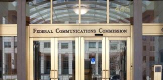 Federal Communications Commission building entrance with gold doors