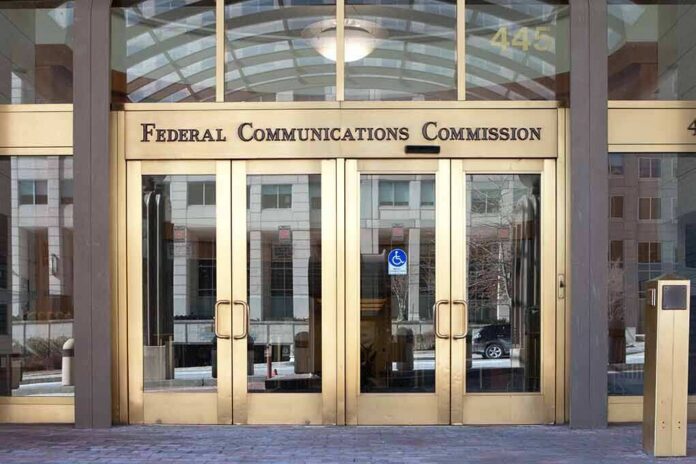 shutterstock_253261441 Federal Communications Commission building entrance with gold doors