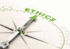 Compass needle pointing to ethics