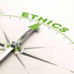 Compass needle pointing to ethics