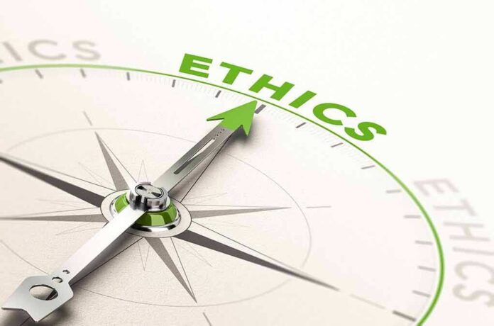 Compass needle pointing to ethics