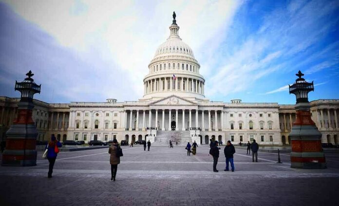 shutterstock_589919459 United States Capitol building with visitors on the plaza