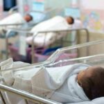 newborns in hospital bassinets