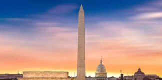 Washington Monument with Lincoln Memorial and U.S. Capitol at sunset