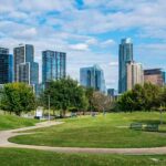 City skyline behind a green urban park