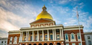 Massachusetts State House with golden dome and columns