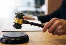 Grim Closet Find Exposes Welfare Grift Judge's hand holding a gavel over a sound block