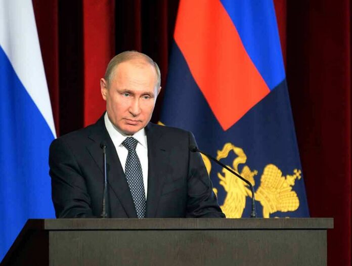 Vladimir Putin speaking at a podium with microphones