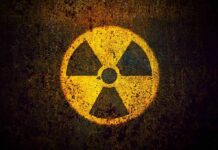 Radiation hazard symbol on a grungy surface