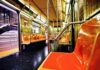 Rush-Hour Killing Sparks Panic Empty subway car with orange seats and open doors