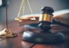 Firefighter’s Nightmarish Trial Twist Judge's gavel on block with scales of justice