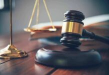 Firefighter’s Nightmarish Trial Twist Judge's gavel on block with scales of justice