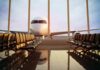 Cockpit Brawl Sparks Terrifying Plunge Airplane seen through terminal windows with empty gate seating