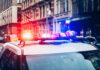 Cyclist Dies After Herald Square Crash Police car with flashing lights in city street