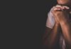 ‘Muslims Hate You’ Line IGNITES Firestorm person with clasped hands in low light