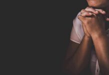 ‘Muslims Hate You’ Line IGNITES Firestorm person with clasped hands in low light