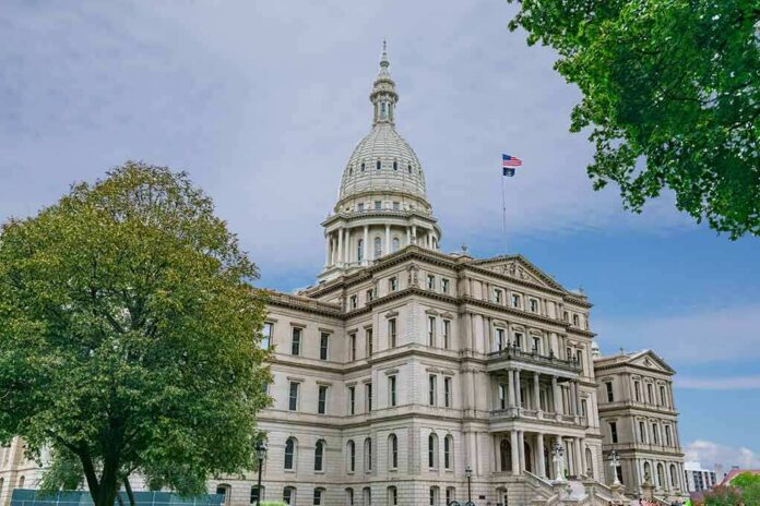 State capitol building with dome and American flag