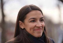 Seven-Figure Jolt Turbocharges Michigan Showdown woman smiling in an outdoor close-up portrait