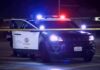 ICE Ends Chases After Deadly Stops Police SUV with flashing lights at night behind yellow tape