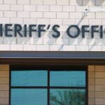 2 A.M. Ambush Stuns Arizona Politics sheriff's office building exterior sign