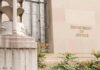 DOJ Links General To U.S. Assassination Plot Department of Justice building facade with stone sign and window