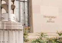 DOJ Links General To U.S. Assassination Plot Department of Justice building facade with stone sign and window
