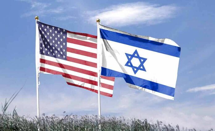 shutterstock_2377025629 United States and Israel flags flying on poles